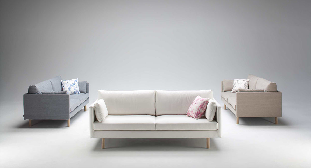 Kolme HT Collectionin Lite-sohvaa: sininen, valkoinen ja beige
