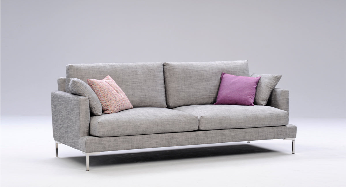 HT Collectionin Next-sohva harmaalla kangasverhoilulla