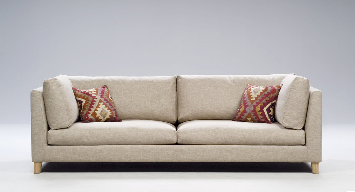HT Collectionin Soul-sohva beigellä kangasverhoilulla